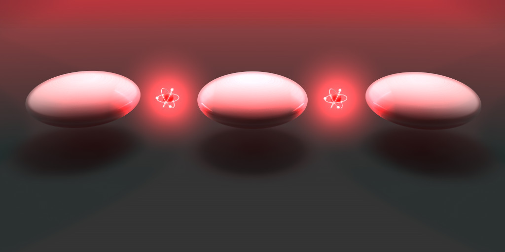 Two qubits are placed inside the feed-gaps of a nanoantenna to reach a strong coupling.